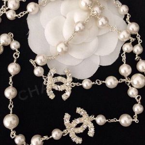 Authentic Chanel white Pearl Iconic 2 CC
